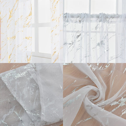 Delikatna firana ze złotym wzorem marmuru