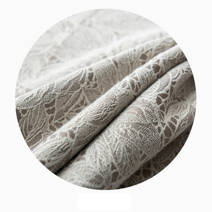 Zasłona złamana biel z wzorem koronki.