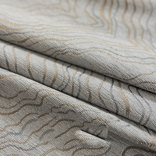 Nowoczesna szara zasłona zaciemniająca w fale.