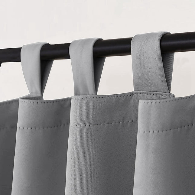 Szara zasłona ogrodowa na pergolę na szelkach.