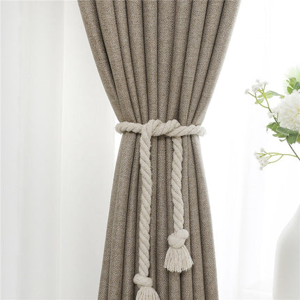 Ciemnobeżowa gładka zasłona do salonu