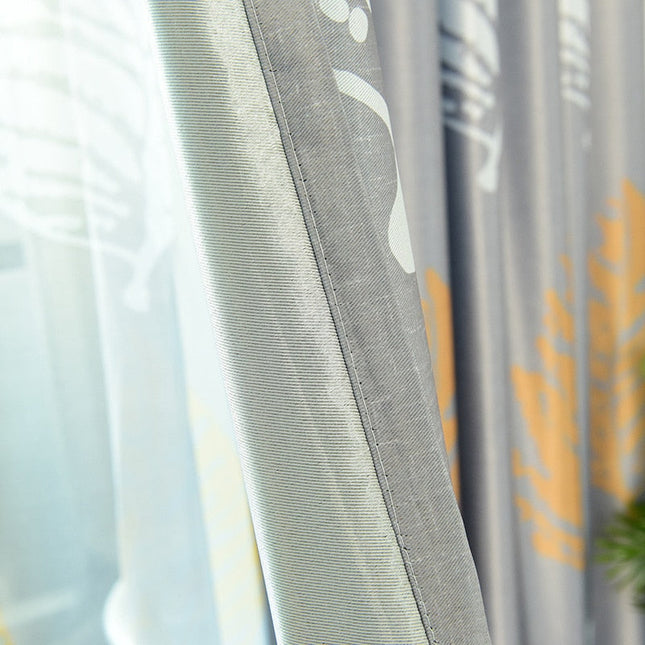 Zasłona z dużym złotym liściem