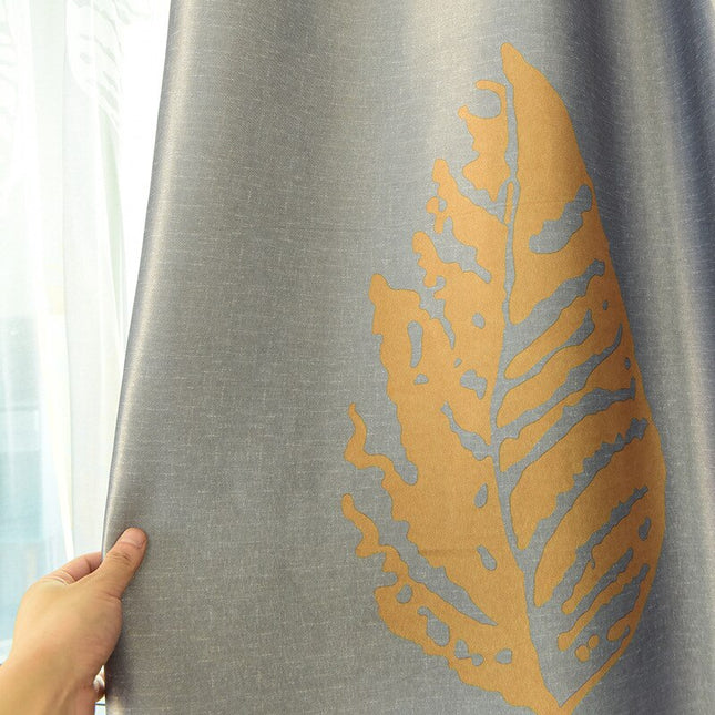 Zasłona z dużym złotym liściem