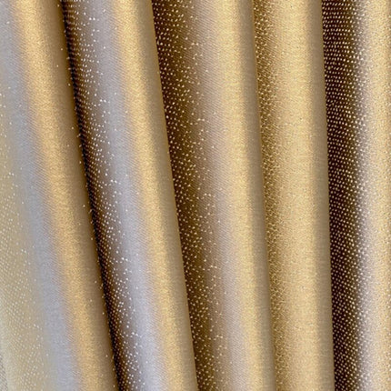 Złota błyszcząca zasłona zaciemniająca z kropkami