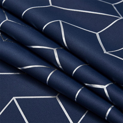 Granatowa zasłona ze złotym geometrycznym wzorem