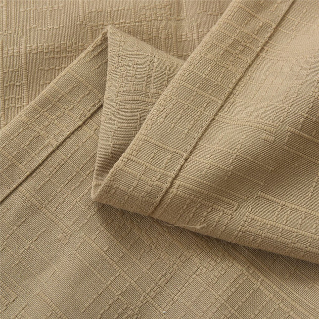 Beżowa zasłona o strukturze lnu