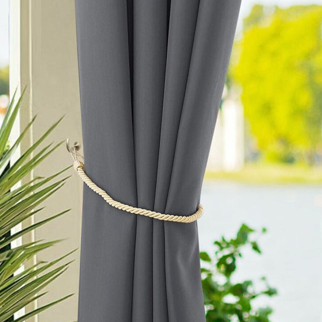 Pomarańczowa zasłona ogrodowa na altanę z przelotkami.