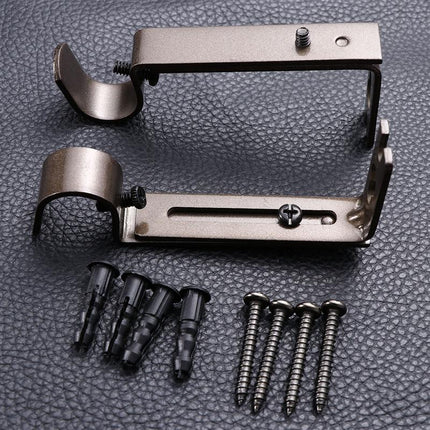 Regulowany wspornik ścienny do karnisza