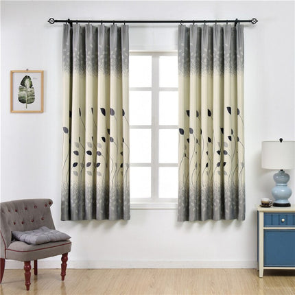 Beżowa zasłona w botaniczny wzór liści.