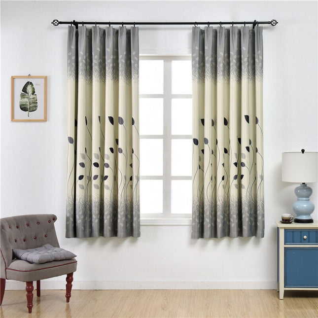 Beżowa zasłona w botaniczny wzór liści.