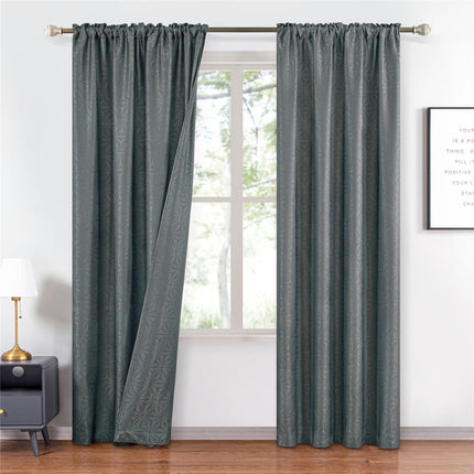 Szara zasłona w geometryczny wzór gwiazd.