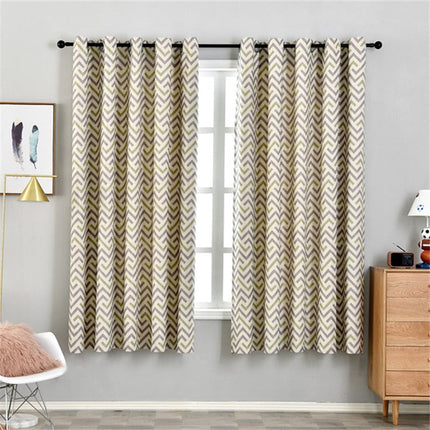 Zasłona w żółto-szary wzór chevron.