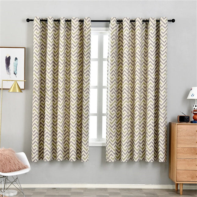 Zasłona w żółto-szary wzór chevron.
