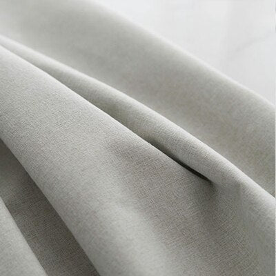 Biała zasłona zaciemniająca o strukturze lnu