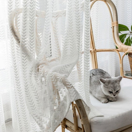 Firana filtrująca światło w geometryczne wzory