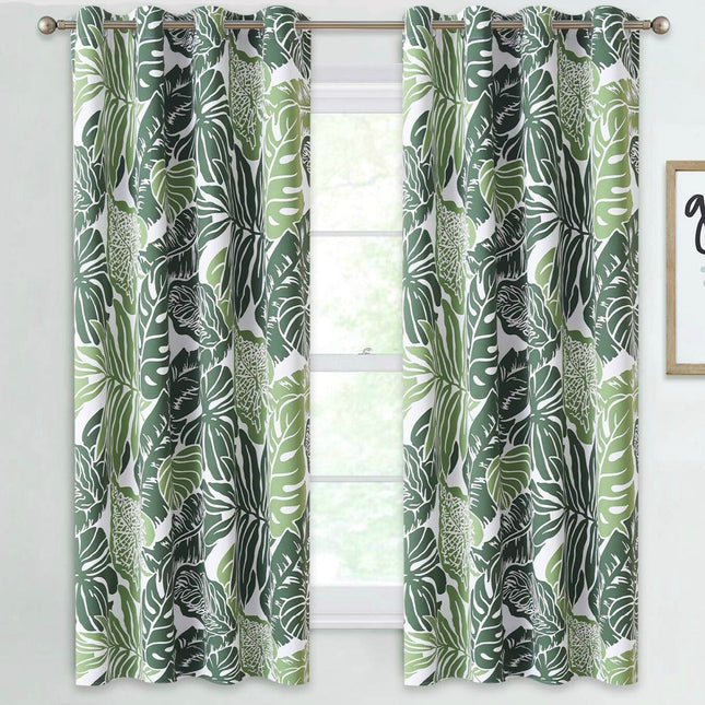 Krótka zasłona w zielone liście monstery.