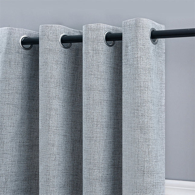 Szara zasłona lniana na przelotkach