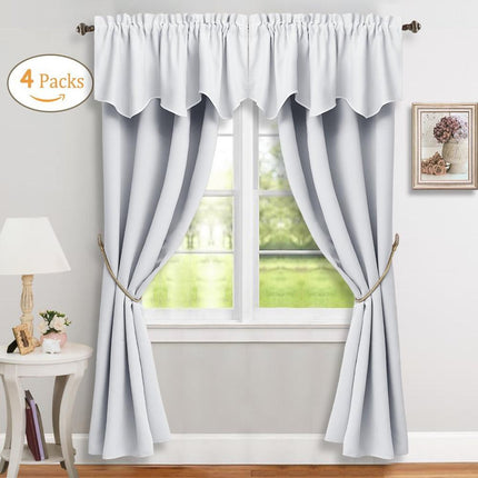 Komplet zasłon zaciemniających z lambrekinem.