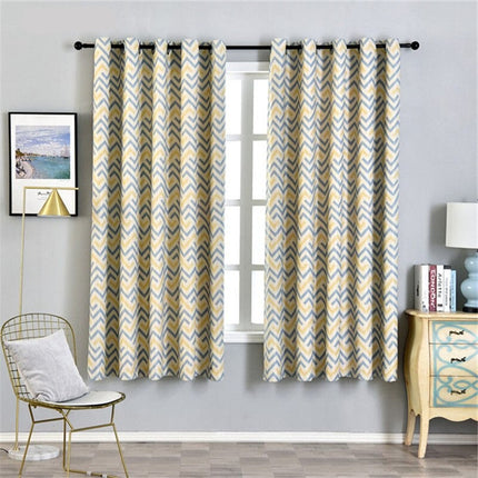 Zasłona w żółto-szary wzór chevron.