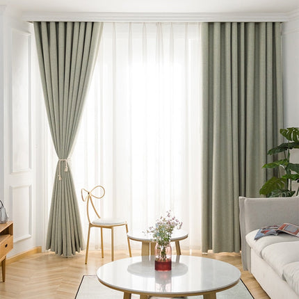 Zielona zasłona zaciemniająca do sypialni