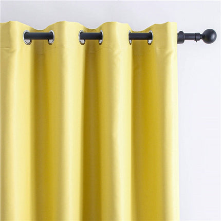 Żółta zasłona zaciemniająca do pokoju dziennego