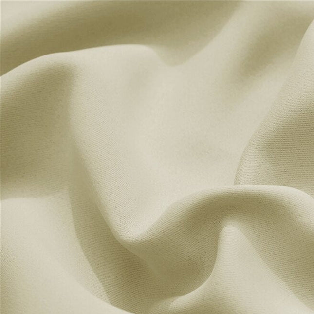 Kremowa wodoodporna zasłona na balkon.