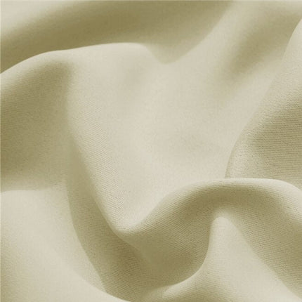 Kremowa wodoodporna zasłona na balkon.