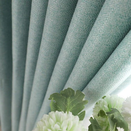Turkusowa zasłona półzaciemniająca do salonu