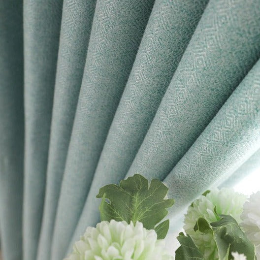 Turkusowa zasłona półzaciemniająca do salonu