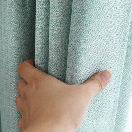 Turkusowa zasłona półzaciemniająca do salonu