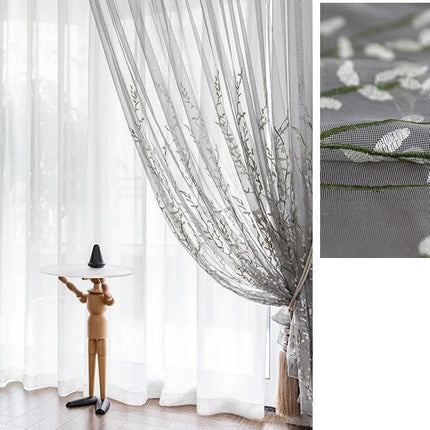 Delikatna firana w haftowane gałązki