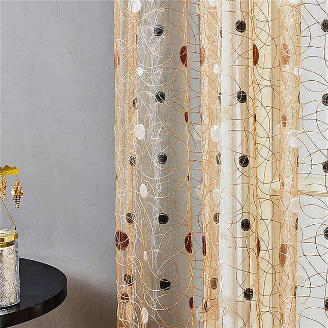 Brązowa firana z haftem na przelotkach