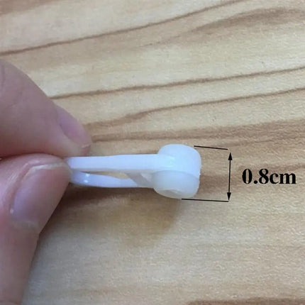 Plastikowe agrafki do firan i zasłon