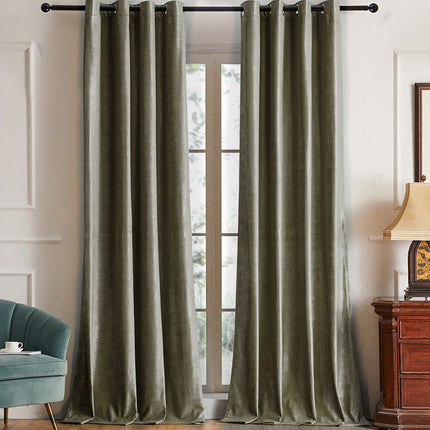 Szara zasłona zaciemniająca w kropki.