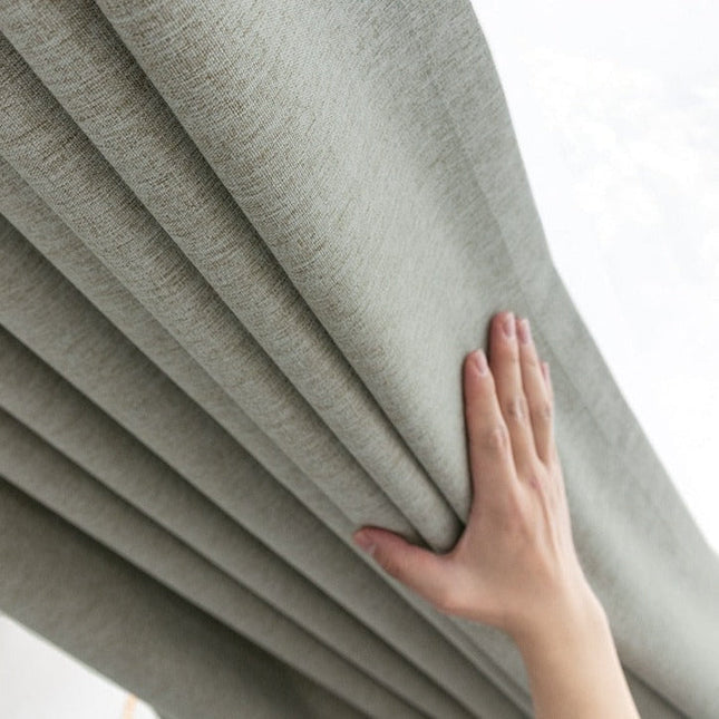 Zielona zasłona zaciemniająca do sypialni