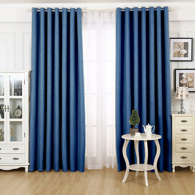 Niebieska dekoracyjna zasłona do salonu