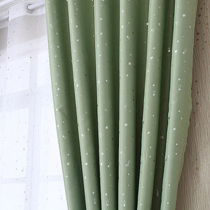Zielona zasłona zaciemniająca w białe gwiazdki